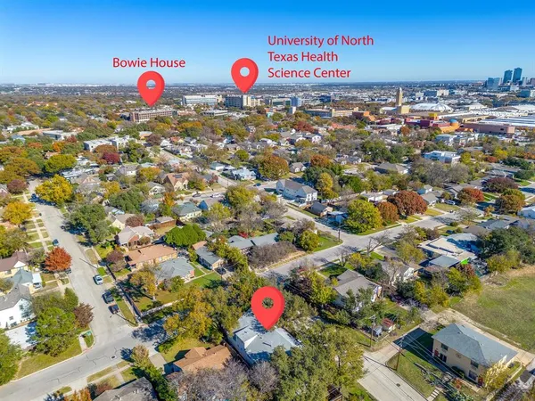 an aerial view of residential building with parking space