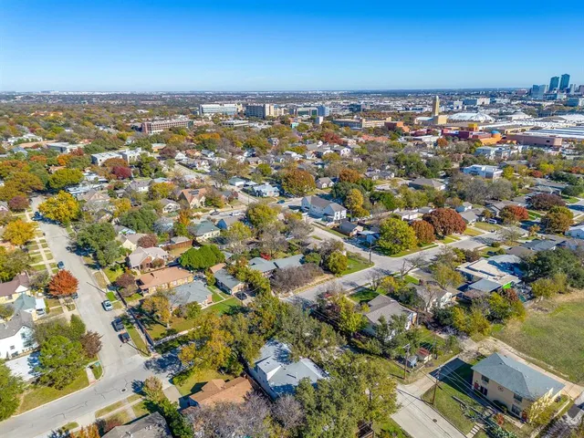 an aerial view of residential building with parking space