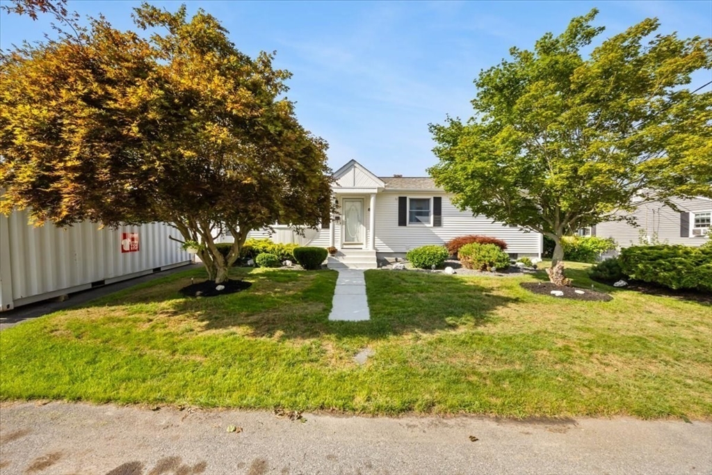 82 Midland Road Somerset, MA 02726 - Photo 3 of 28 a front view of a house with garden