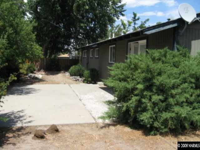 875 Lahontan Way Reno, NV 89509 - Photo 5 of 5 a backyard of a house with lots of green space