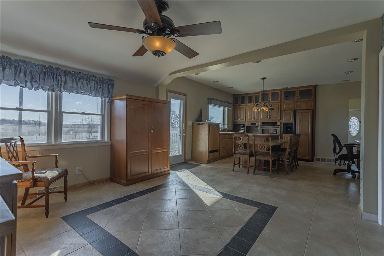 15283 Trask Bridge Road Pecatonica, IL 61063 - Photo 4 of 25 a view of a livingroom with furniture and a window
