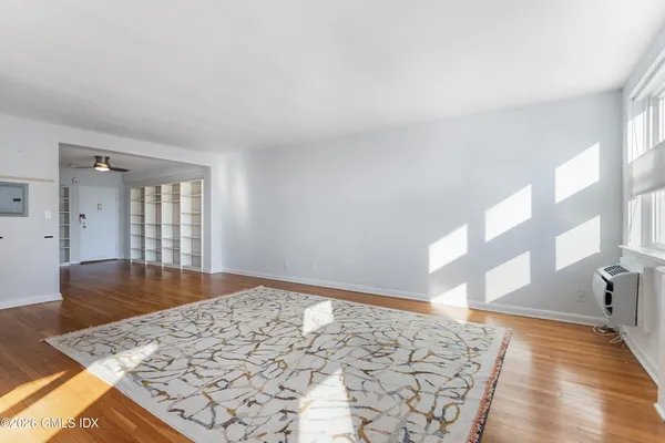 a view of an empty room and window