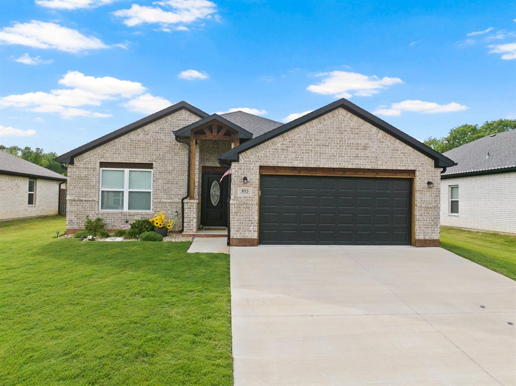 103 St James Mount Mount Pleasant, TX 75455 - Photo 1 of 39 a front view of house with yard and green space