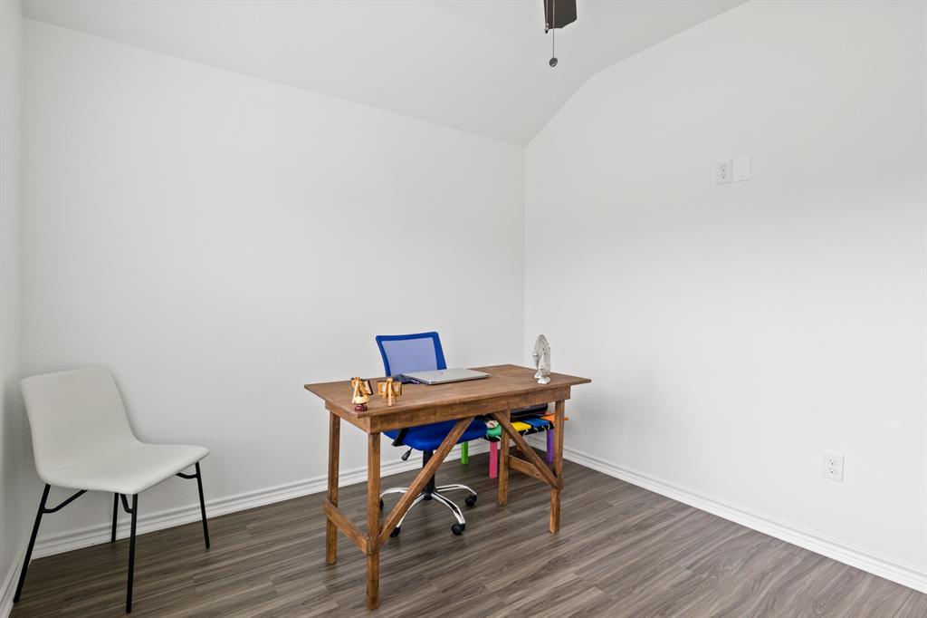 103 St James Mount Mount Pleasant, TX 75455 - Photo 20 of 39 a view of a workspace with furniture and wooden floor