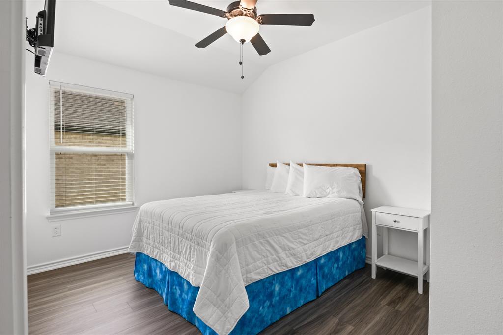 103 St James Mount Mount Pleasant, TX 75455 - Photo 22 of 39 a bedroom with a bed and a window