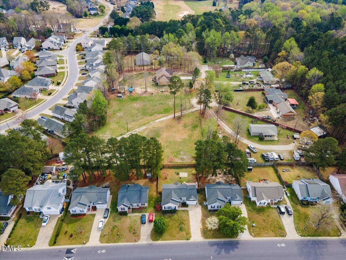 7201 Applecreek Court Raleigh, NC 27610 - Photo 11 of 17 an aerial view of residential houses with outdoor space