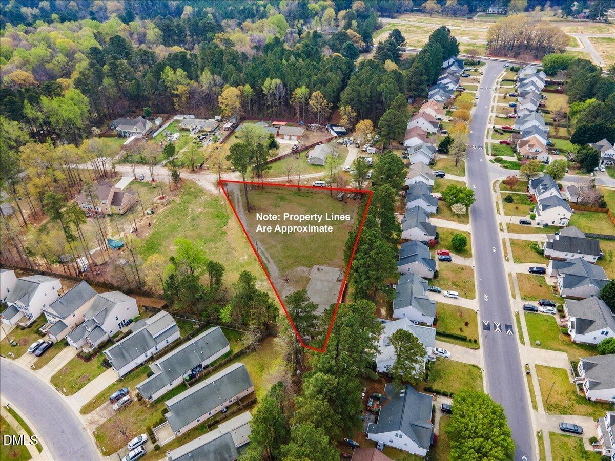 7201 Applecreek Court Raleigh, NC 27610 - Photo 3 of 17 an aerial view of residential house with outdoor space and swimming pool