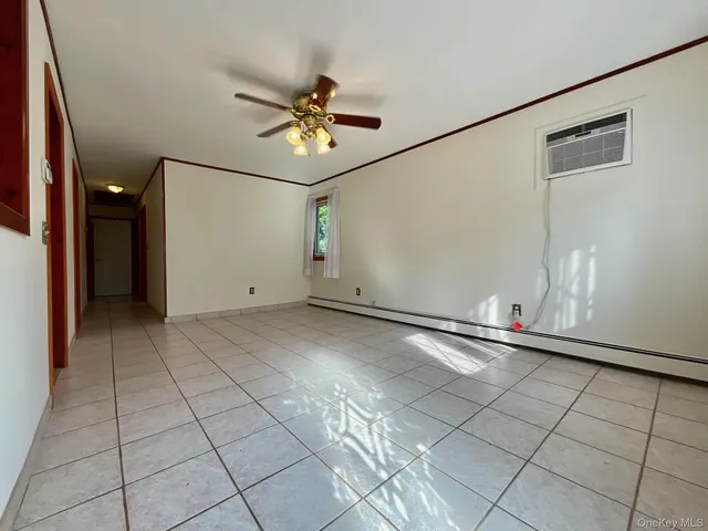 a view of a room with natural light