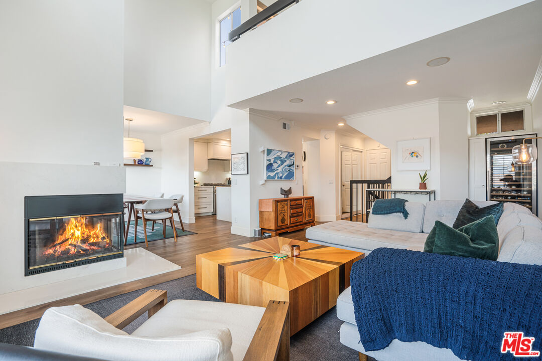 2808 Arizona Avenue, Unit 3 Santa Monica, CA 90404 - Photo 2 of 20 a living room with furniture and a flat screen tv