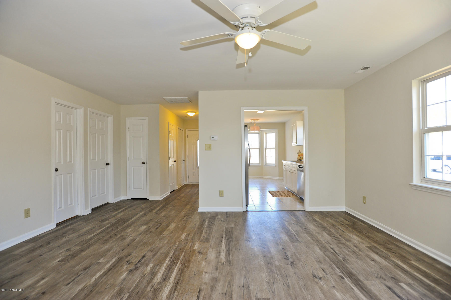 2050 Derby Run Road Jacksonville, NC 28546 - Photo 13 of 28 New laminate hardwood in main living area
