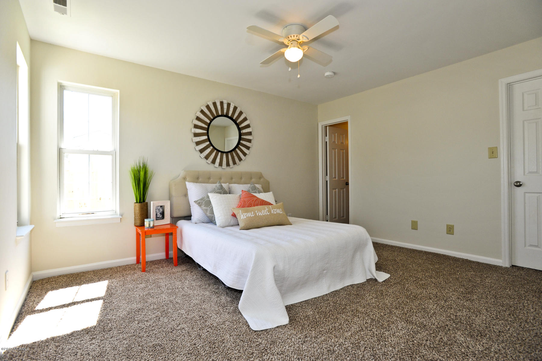 2050 Derby Run Road Jacksonville, NC 28546 - Photo 16 of 28 Master bedroom has new paint, new carpet & new light fixture.