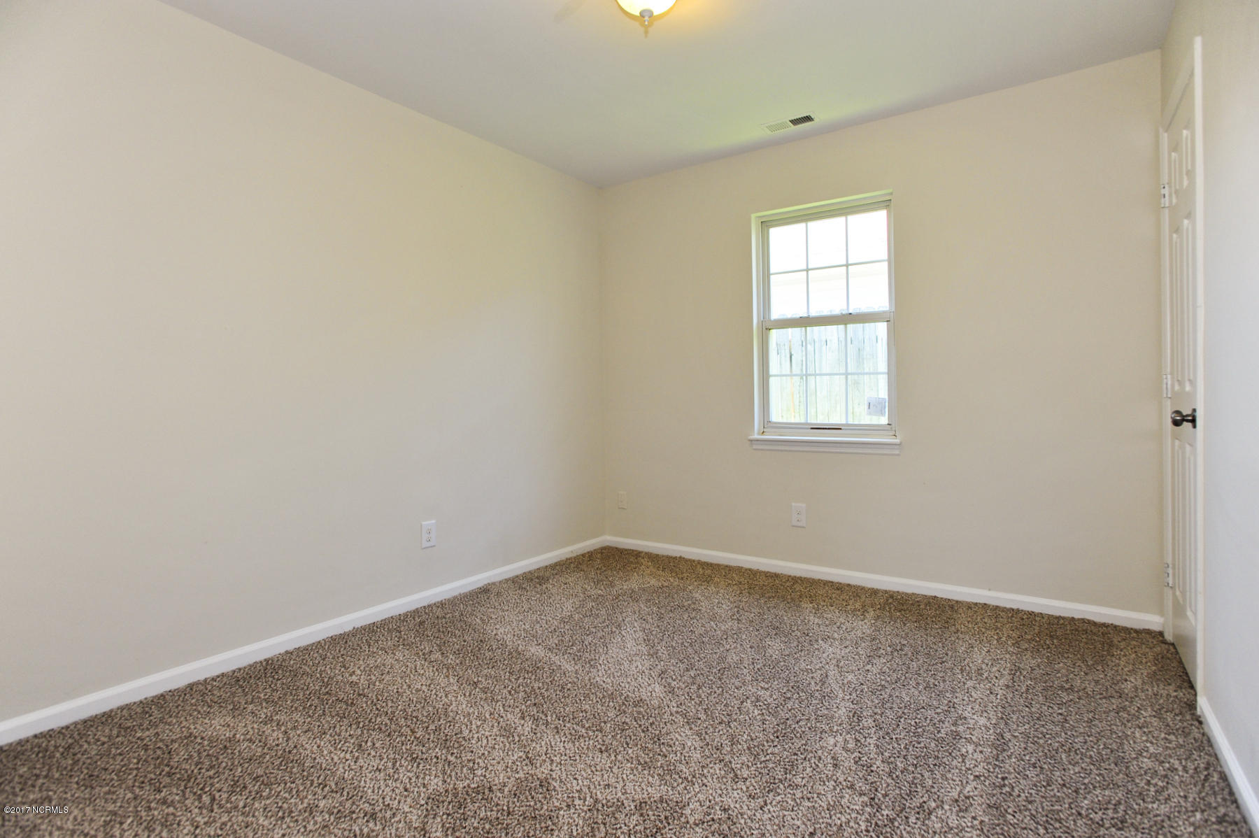 2050 Derby Run Road Jacksonville, NC 28546 - Photo 20 of 28 Bedroom 2- new paint, new carpet & new light fixture