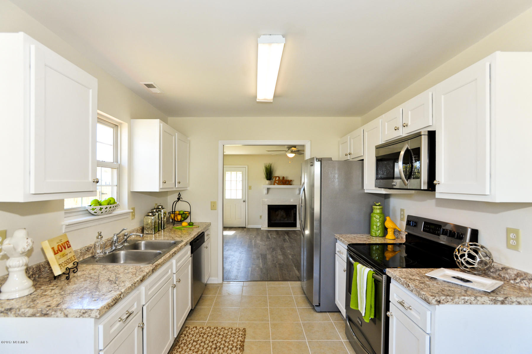 2050 Derby Run Road Jacksonville, NC 28546 - Photo 6 of 28 New fermica counter tops , freshly painted kitchen cabinets & new stainless steel appliances