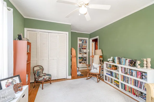 a room with furniture and gym equipment