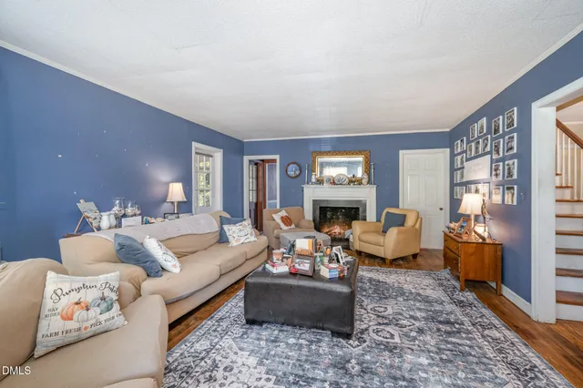 a living room with furniture or couch and a window