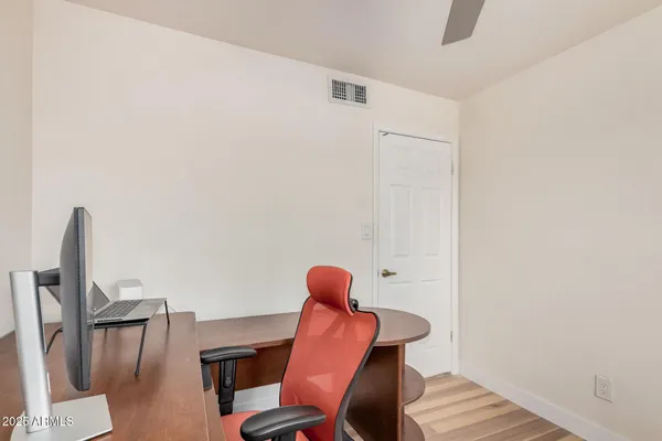a table and chairs in a room