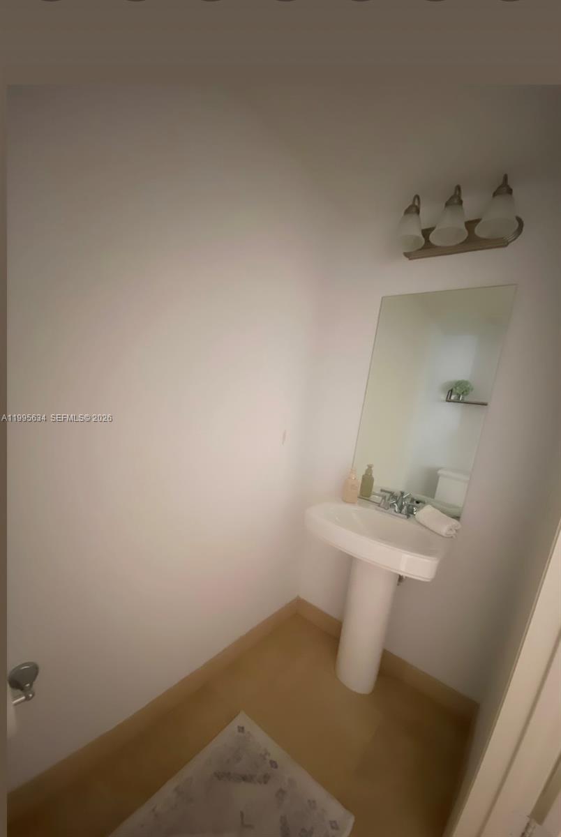 55 Merrick Way, Unit 800 Coral Gables, FL 33134 - Photo 8 of 33 a bathroom with a sink