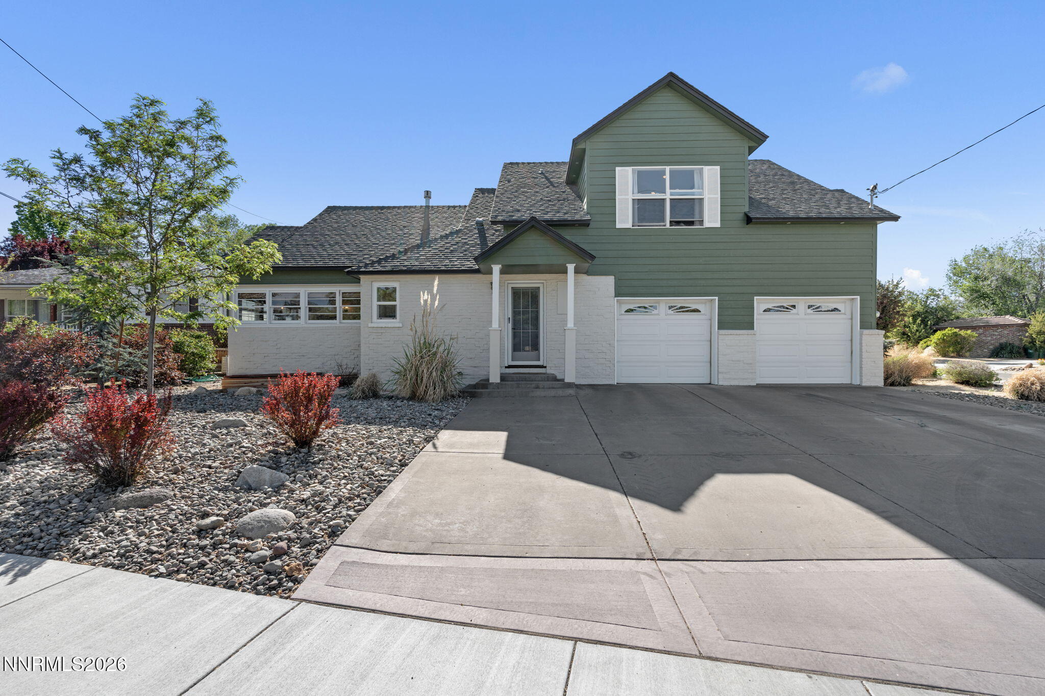 300 Country Club Drive Reno, NV 89509 - Photo 4 of 48 front view of a house with a yard