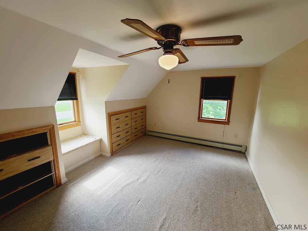 3160 Blue Goose Road Nicktown, PA 15762 - Photo 15 of 37 a view of an empty room with a window and a kitchen
