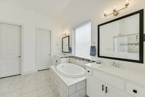 a bathroom with a sink and a bathtub