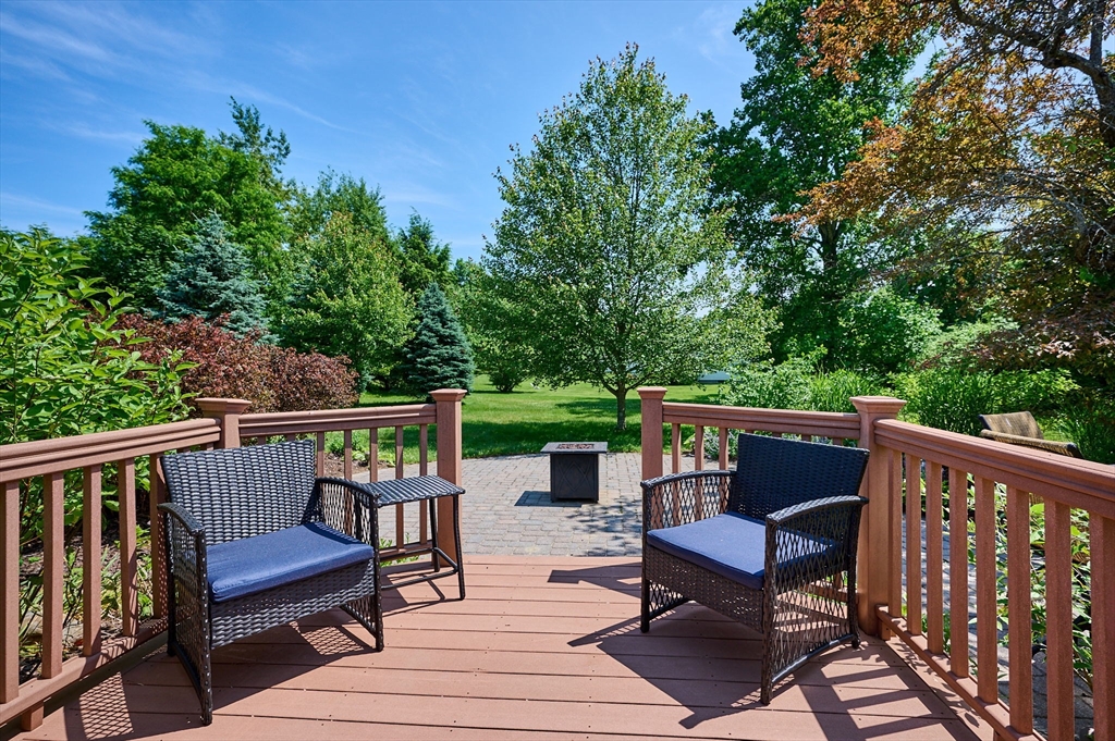 985 Tinkham Road Wilbraham, MA 01095 - Photo 22 of 27 a view of chairs on wooden deck