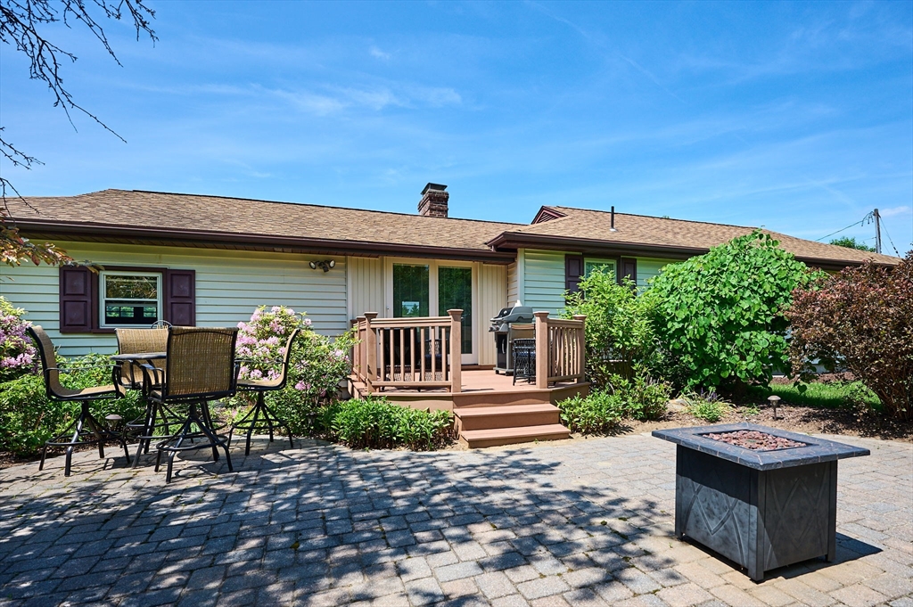 985 Tinkham Road Wilbraham, MA 01095 - Photo 24 of 27 a front view of a house with garden
