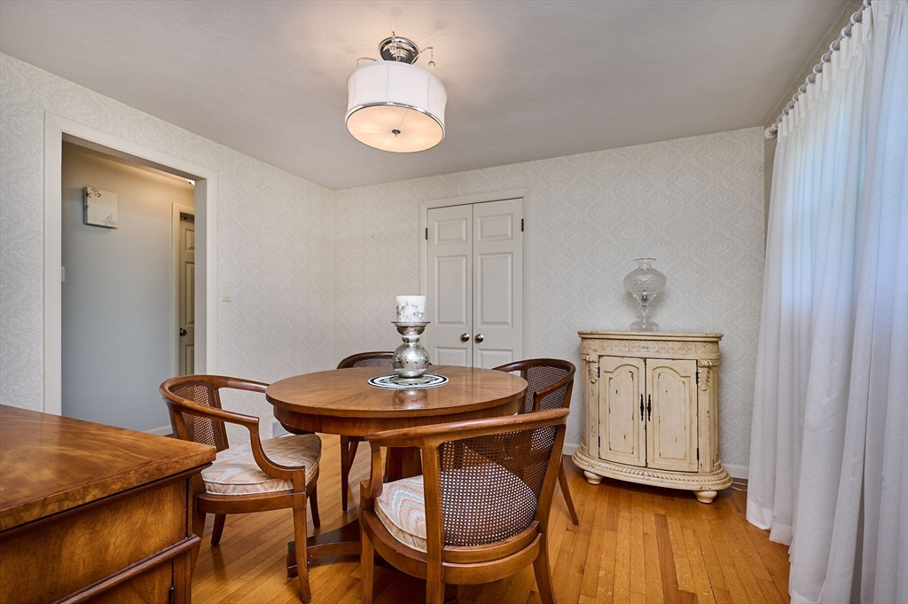 985 Tinkham Road Wilbraham, MA 01095 - Photo 8 of 27 a view of a dining room with furniture and wooden floor