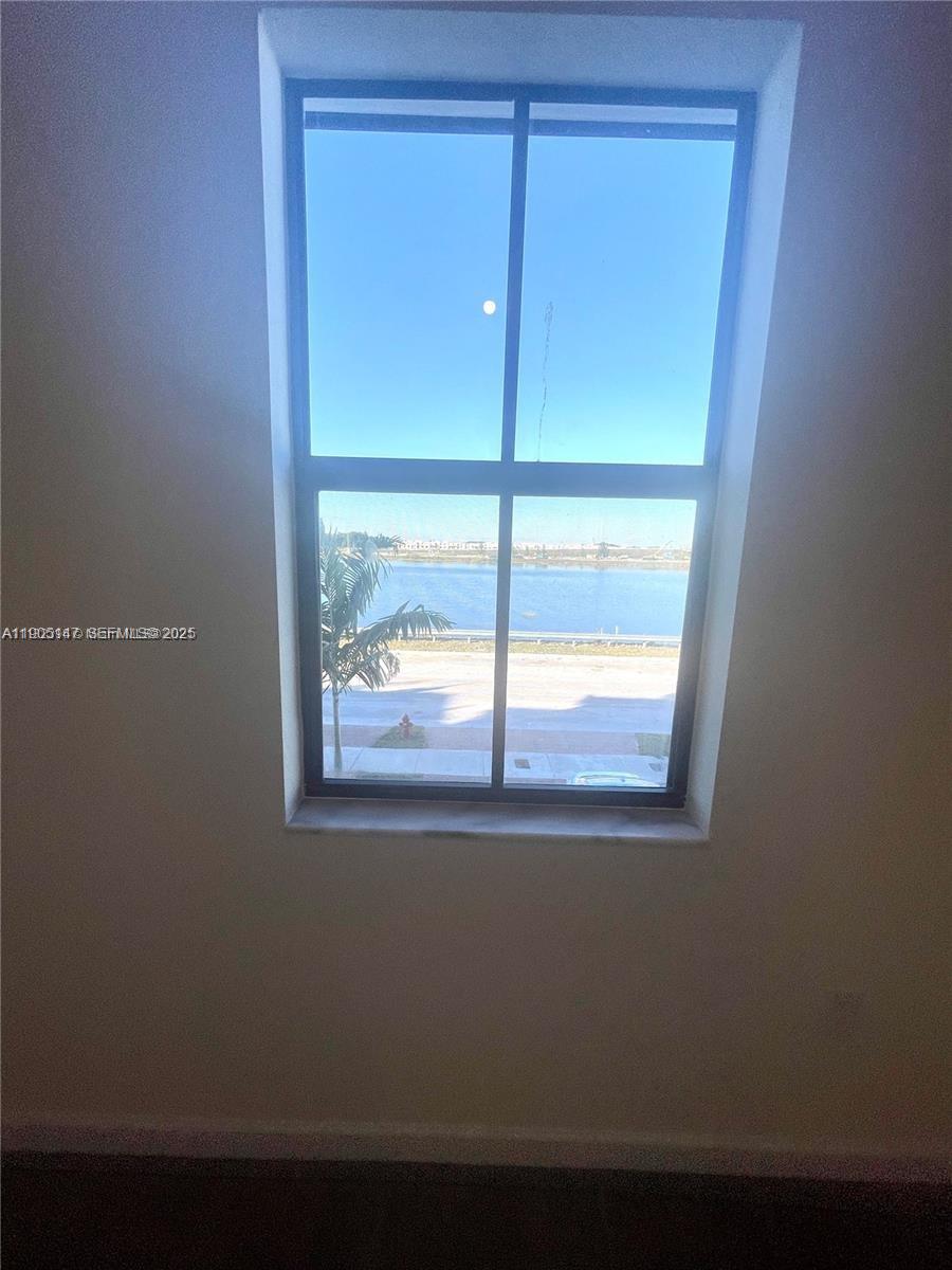 3338 West 112th Street Hialeah, FL 33018 - Photo 31 of 40 a view of empty room with window