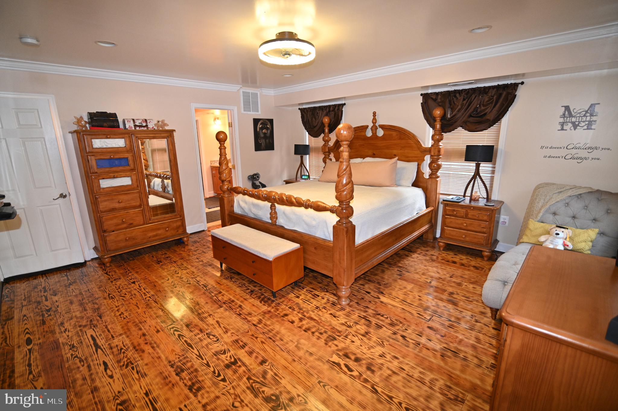 3407 Wayneswood Road Fort Washington, MD 20744 - Photo 16 of 70 a bedroom with furniture and wooden floor