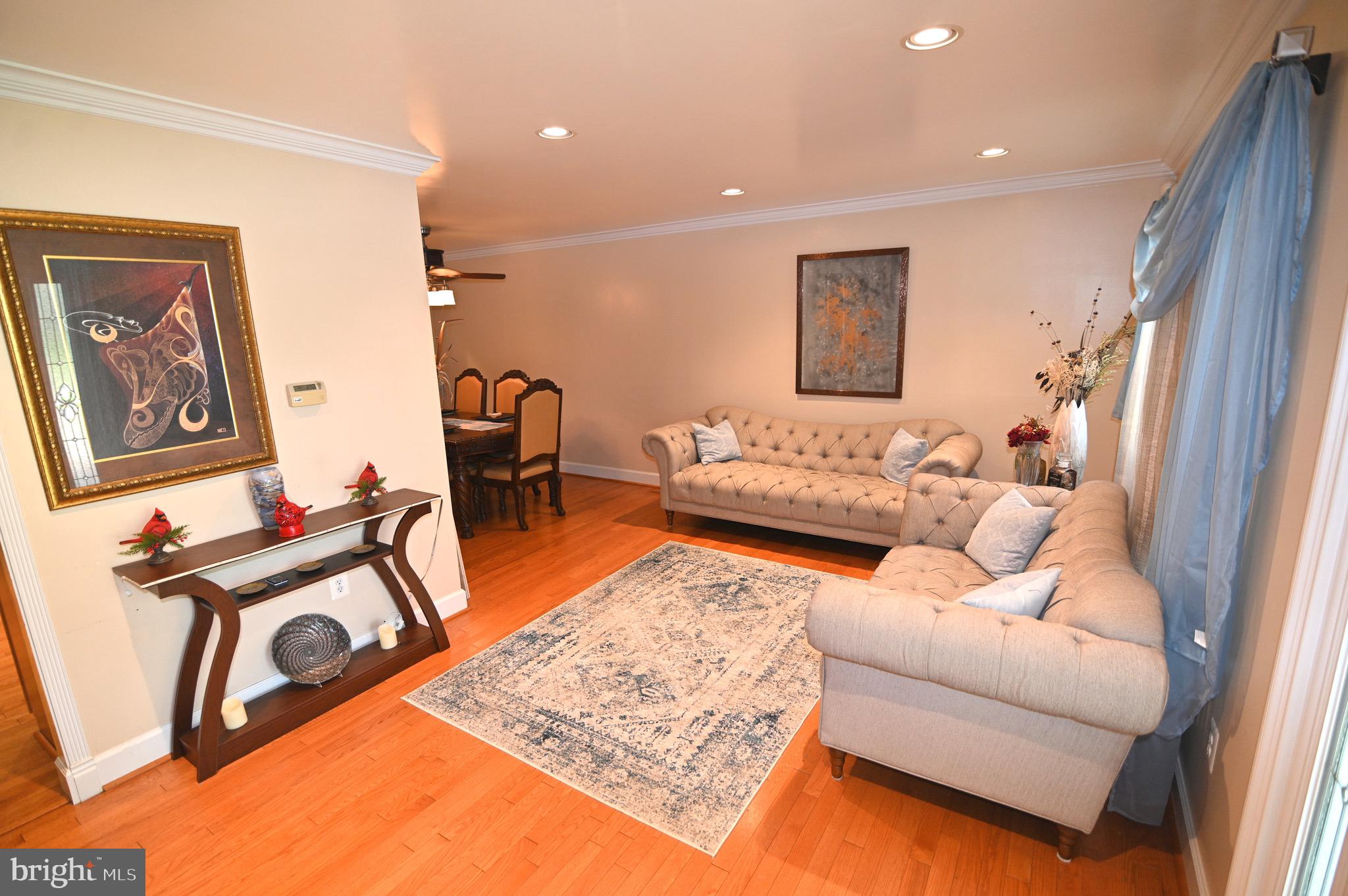 3407 Wayneswood Road Fort Washington, MD 20744 - Photo 2 of 70 a living room with furniture and a rug
