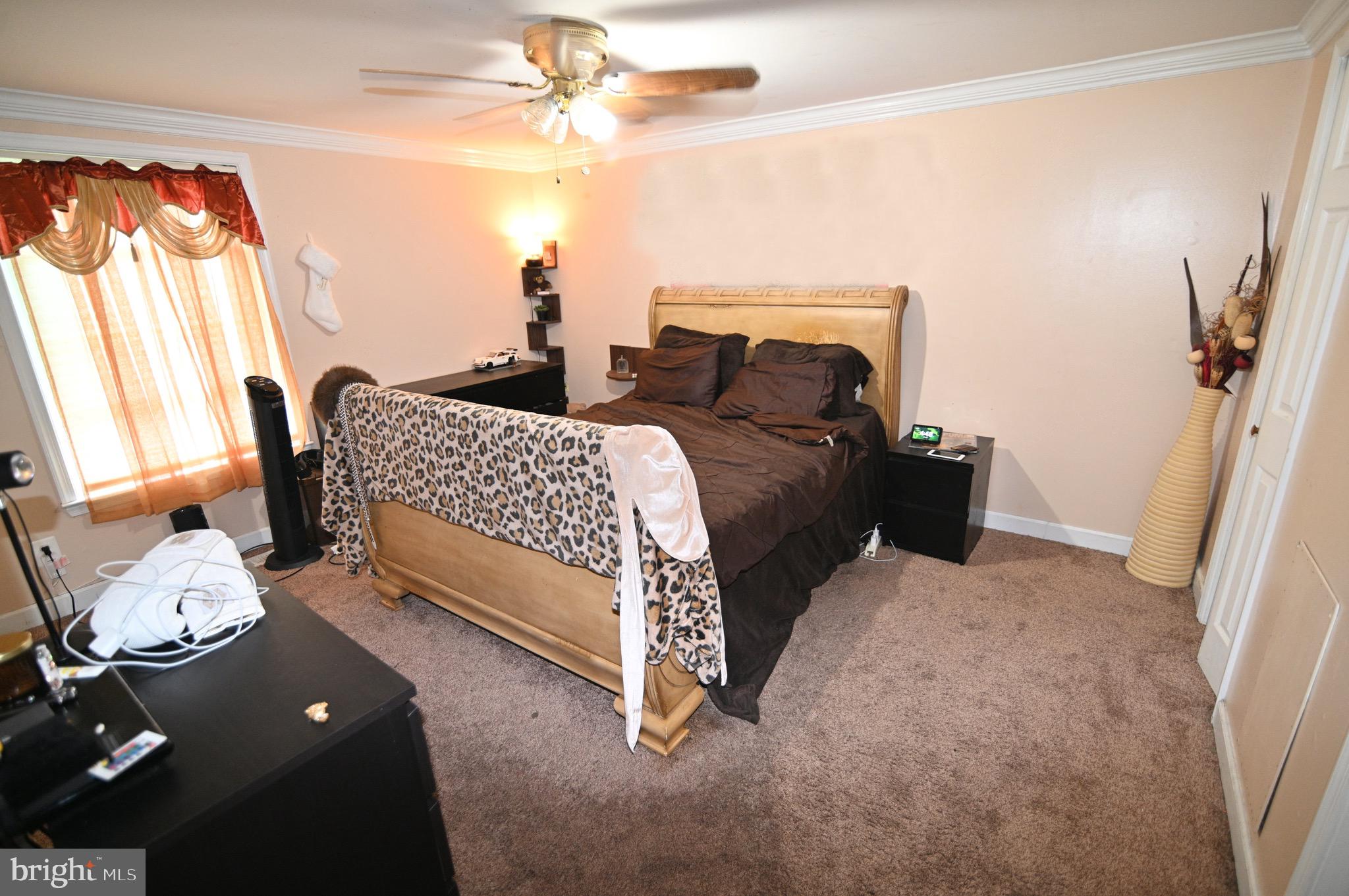 3407 Wayneswood Road Fort Washington, MD 20744 - Photo 25 of 70 a bed room with a bed and a window