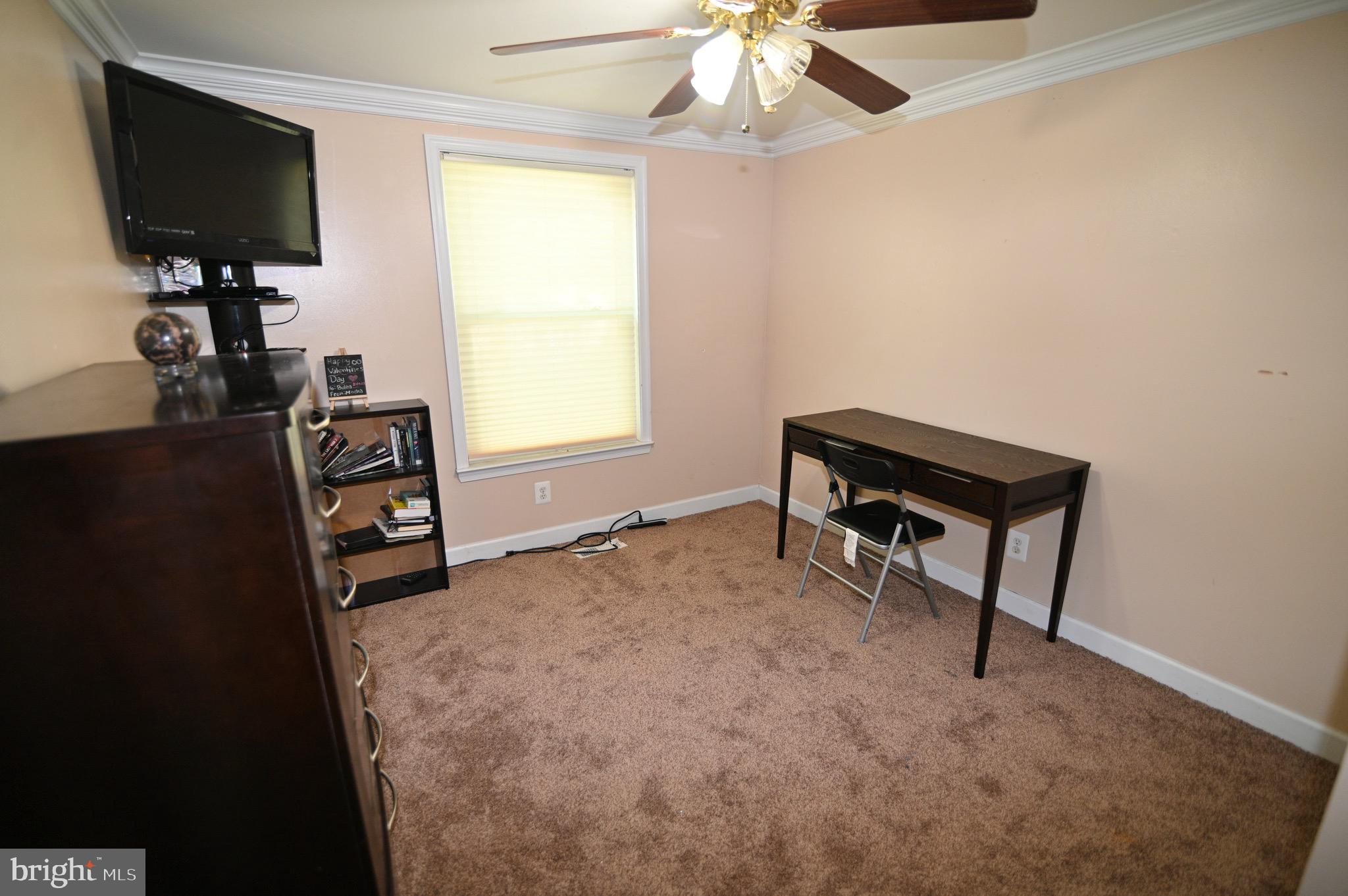 3407 Wayneswood Road Fort Washington, MD 20744 - Photo 30 of 70 a living room with furniture and a flat screen tv