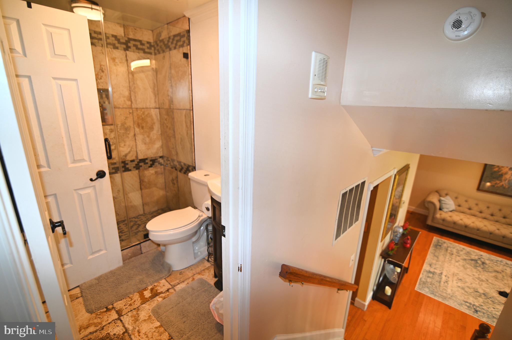 3407 Wayneswood Road Fort Washington, MD 20744 - Photo 33 of 70 a bathroom with a toilet and a shower