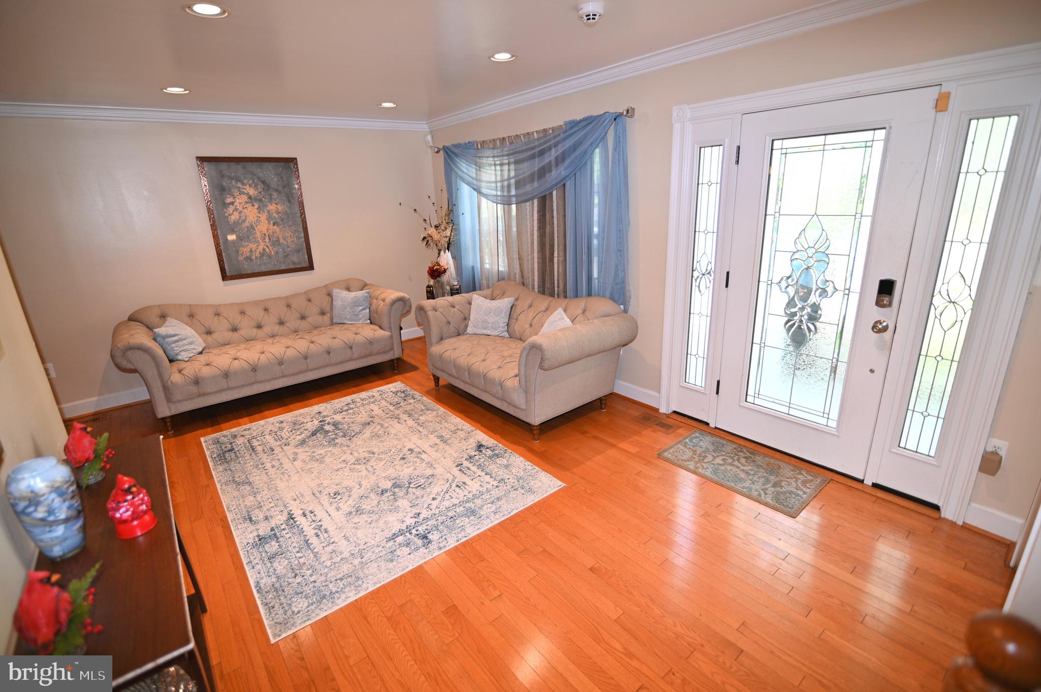 3407 Wayneswood Road Fort Washington, MD 20744 - Photo 4 of 70 a living room with furniture and wooden floor