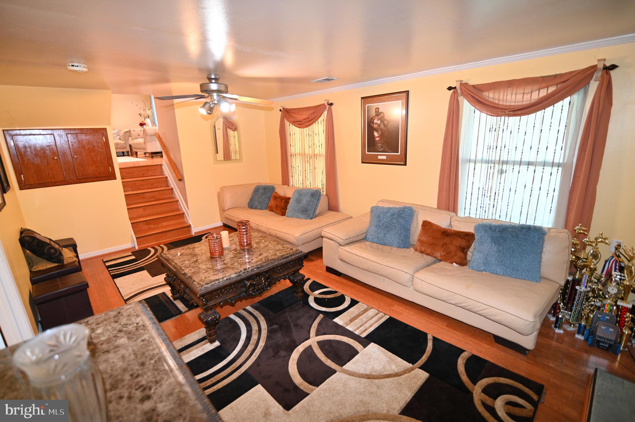 3407 Wayneswood Road Fort Washington, MD 20744 - Photo 49 of 70 a living room with furniture and a large window