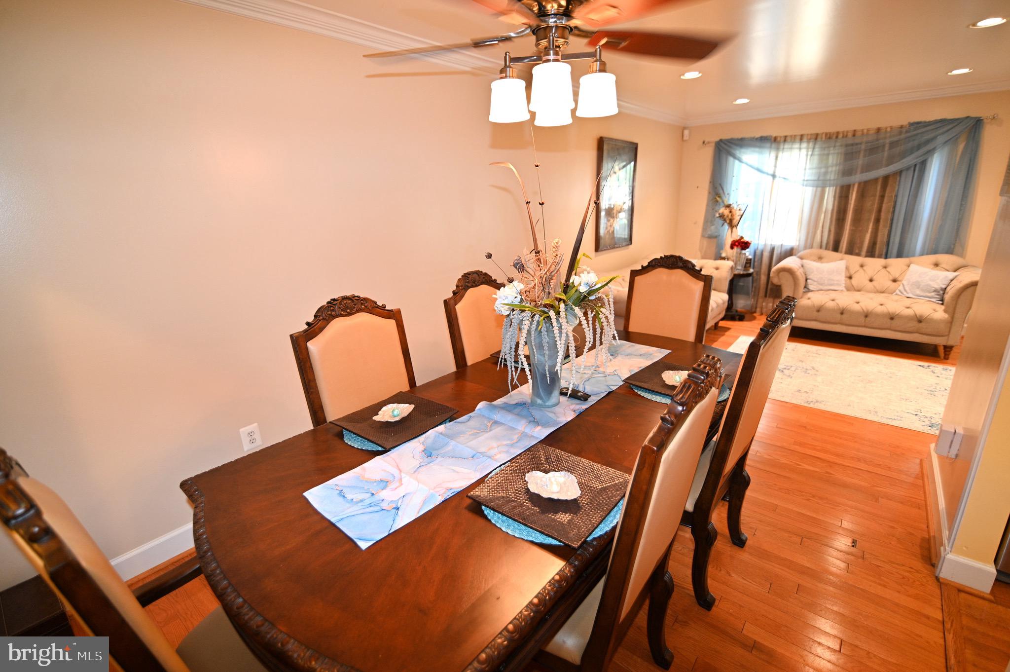 3407 Wayneswood Road Fort Washington, MD 20744 - Photo 5 of 70 a view of a dining room with furniture and chandelier