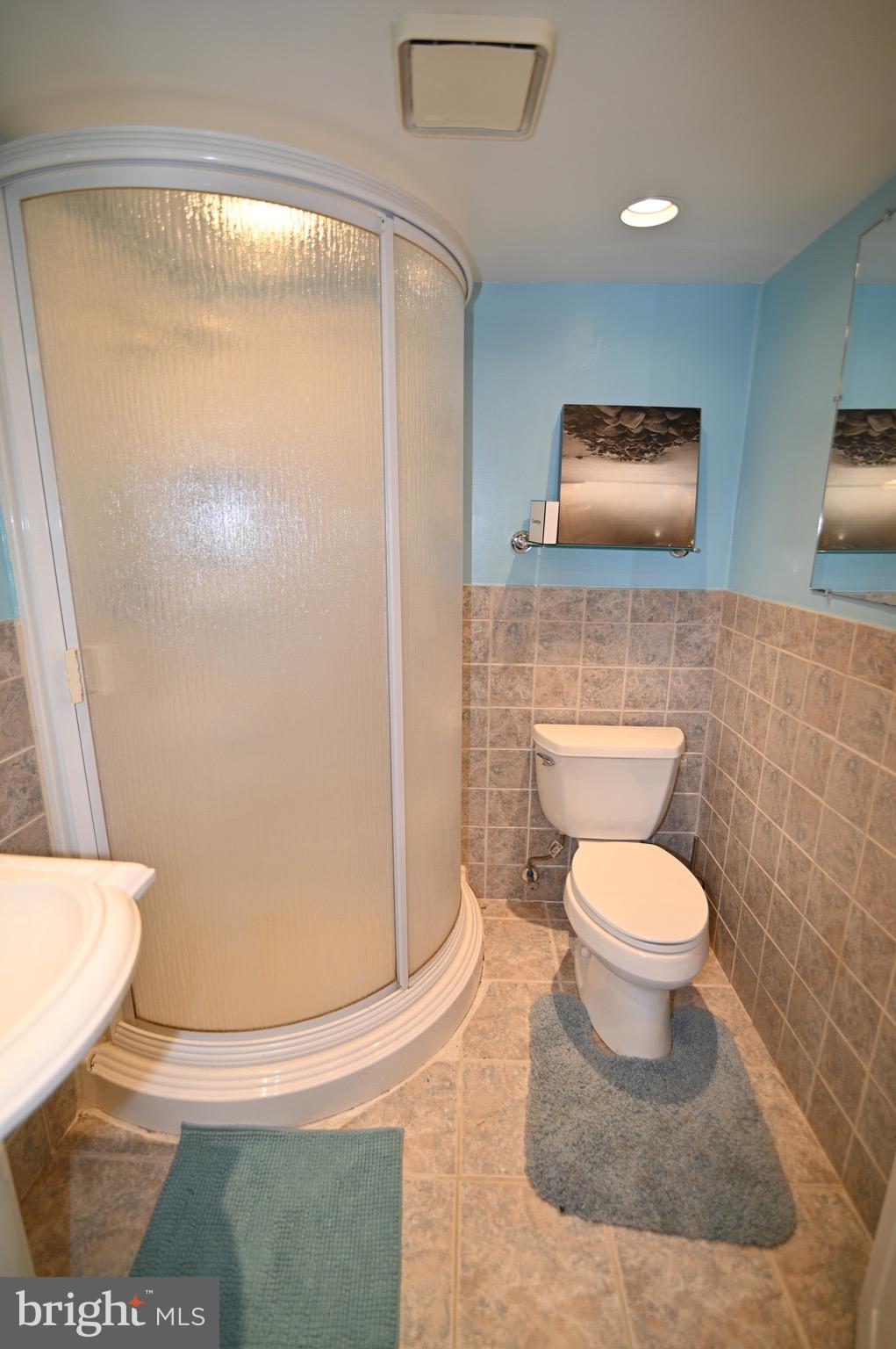 3407 Wayneswood Road Fort Washington, MD 20744 - Photo 54 of 70 a bathroom with a toilet and a shower