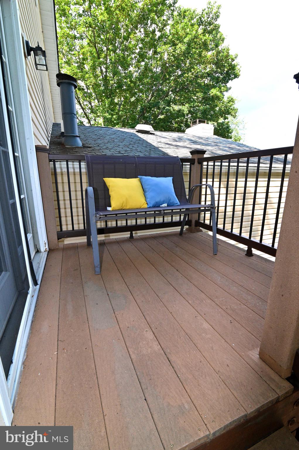 3407 Wayneswood Road Fort Washington, MD 20744 - Photo 55 of 70 a view of a balcony with chair and wooden floor