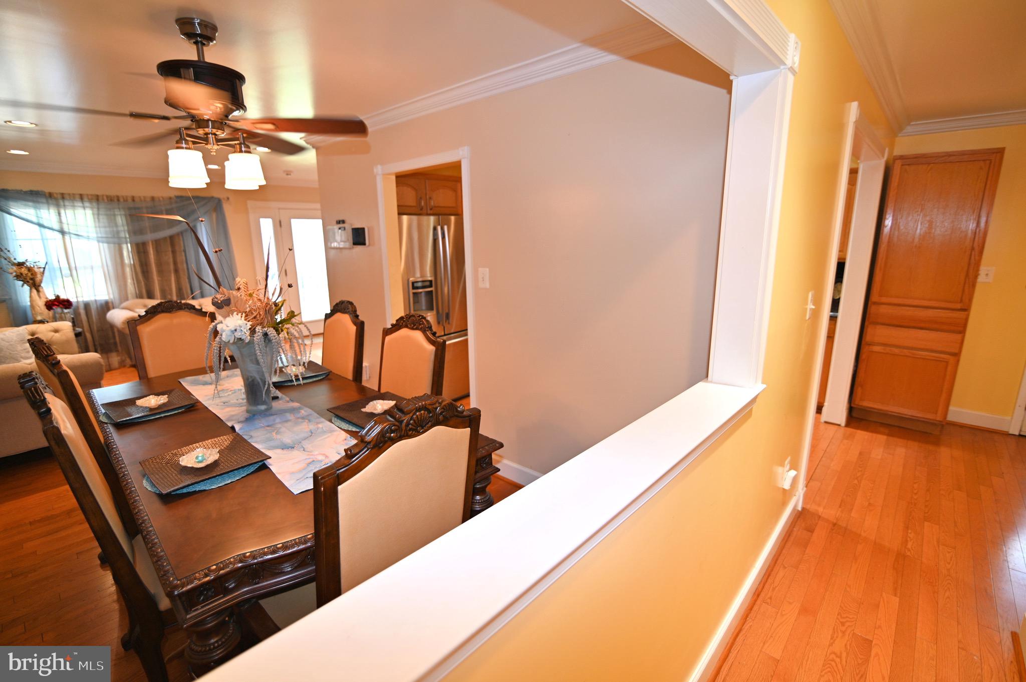 3407 Wayneswood Road Fort Washington, MD 20744 - Photo 6 of 70 a view of dining room with furniture and chandelier