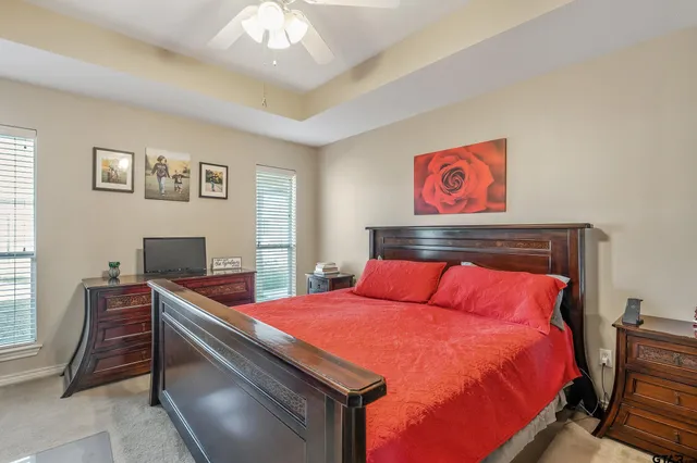 a bedroom with a bed and furniture