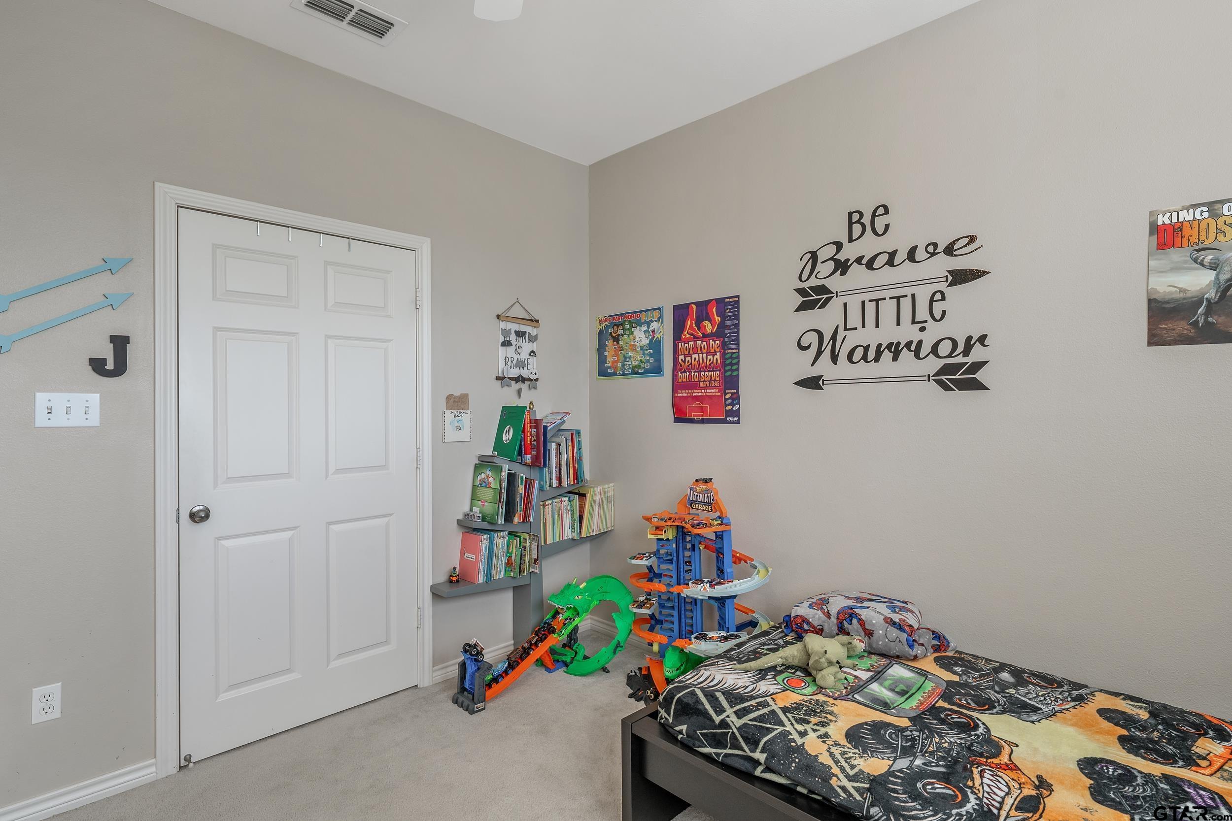 20081 Bluegrass Circle Flint, TX 75762 - Photo 17 of 24 a room with toys and wooden floor