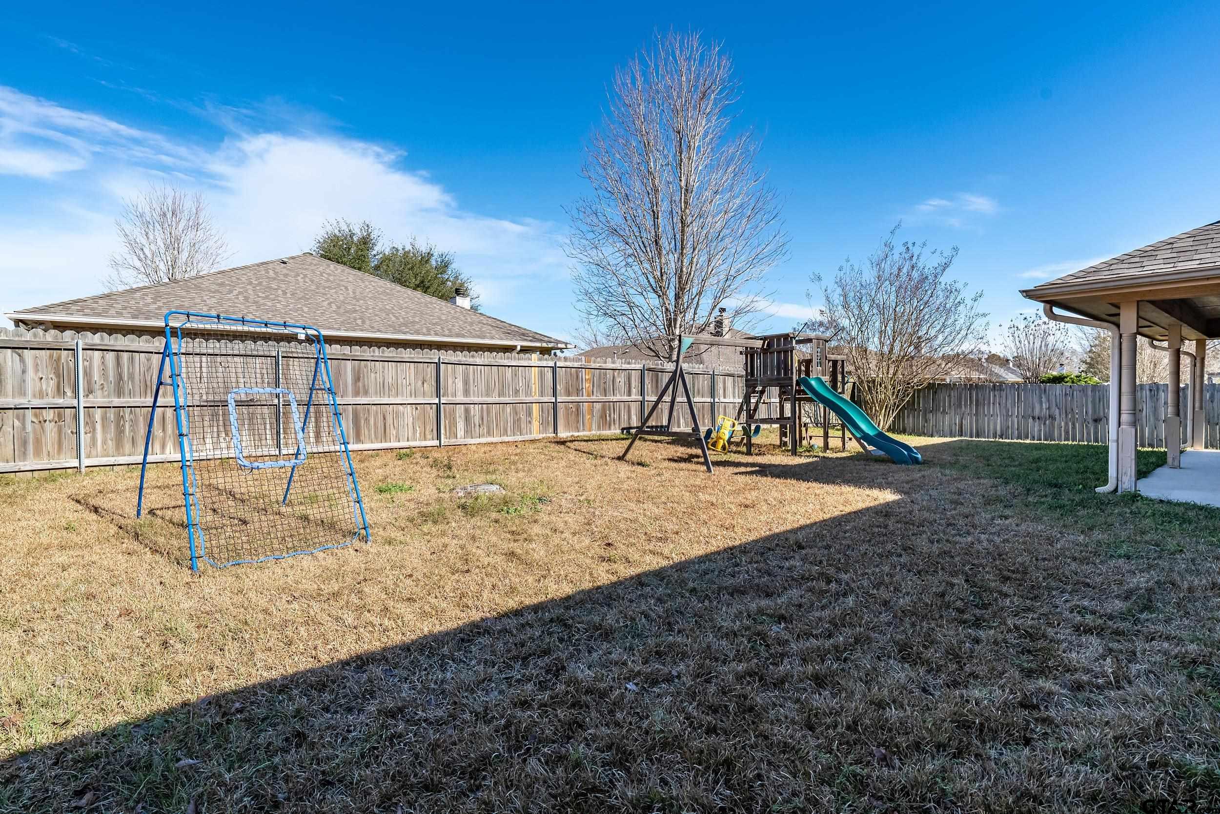 20081 Bluegrass Circle Flint, TX 75762 - Photo 18 of 24 a view of a house with a yard