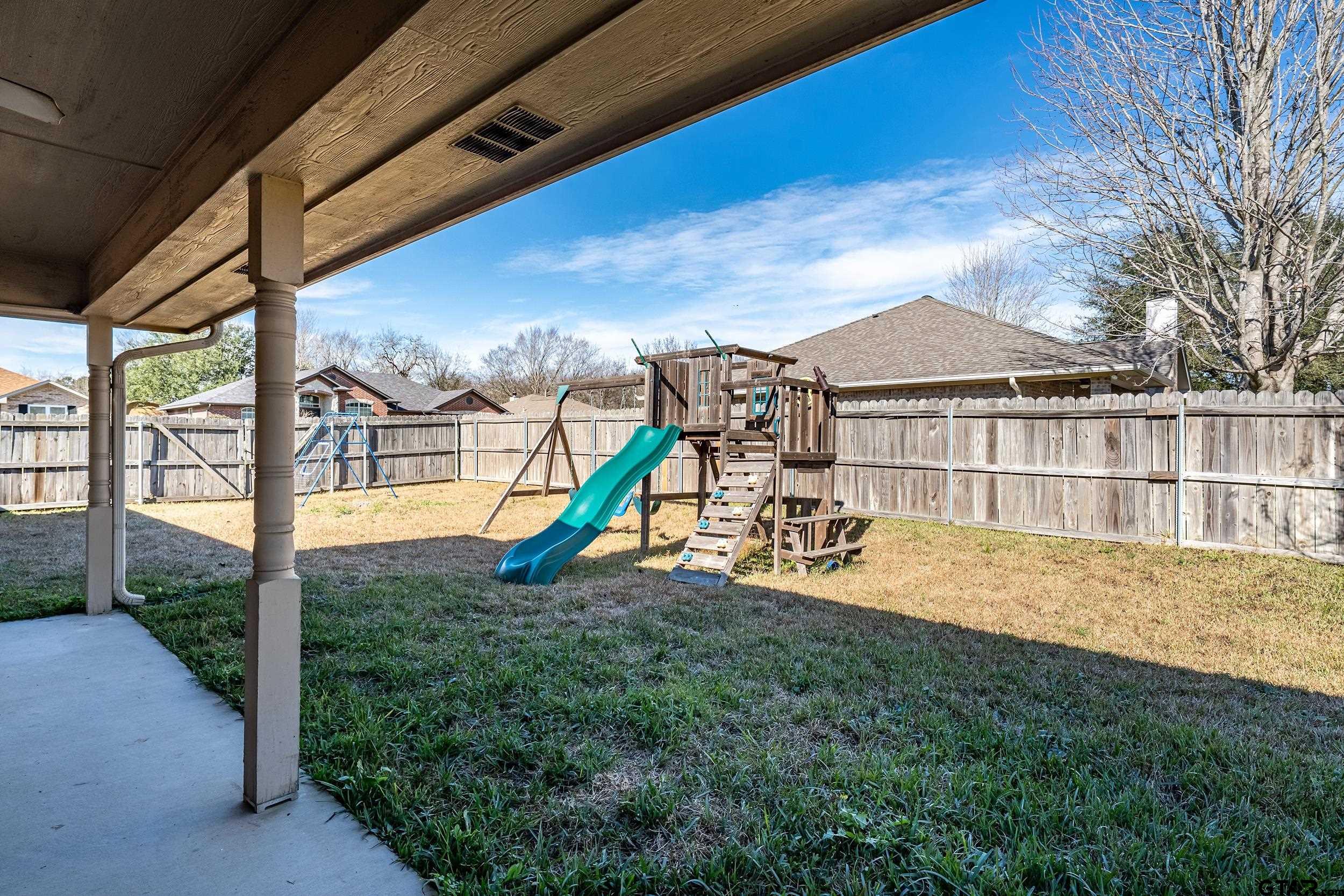 20081 Bluegrass Circle Flint, TX 75762 - Photo 21 of 24 a view of a house with backyard porch and sitting area