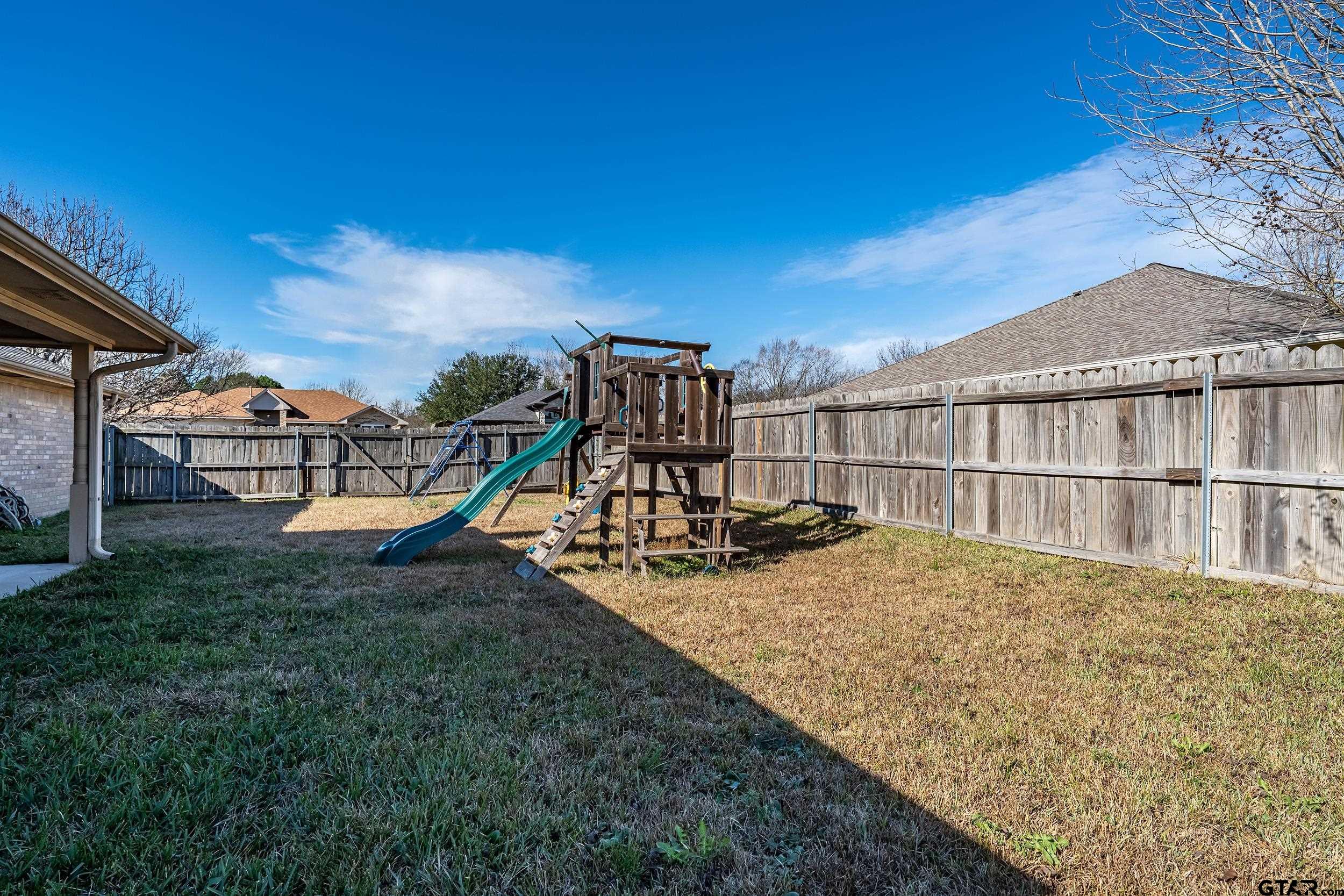 20081 Bluegrass Circle Flint, TX 75762 - Photo 22 of 24 a view of a house with backyard