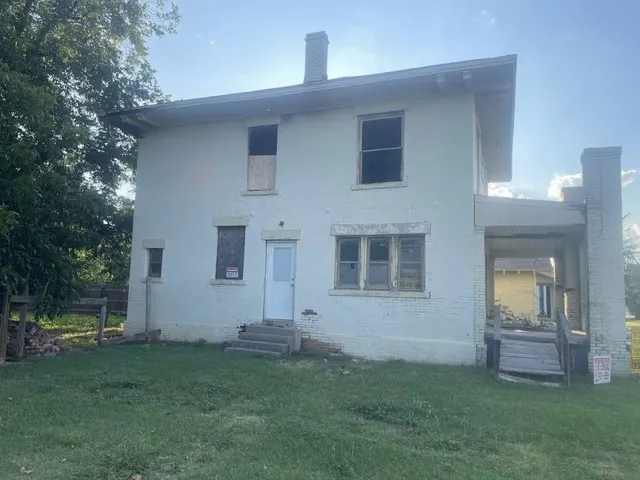a backyard of a house with lots of green space