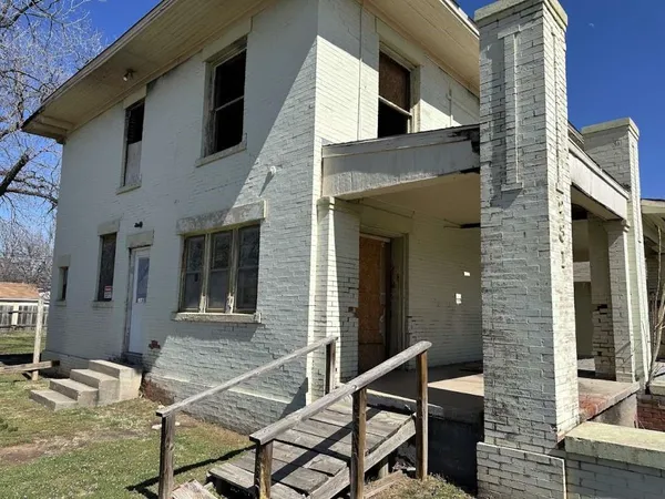 a view of house with patio