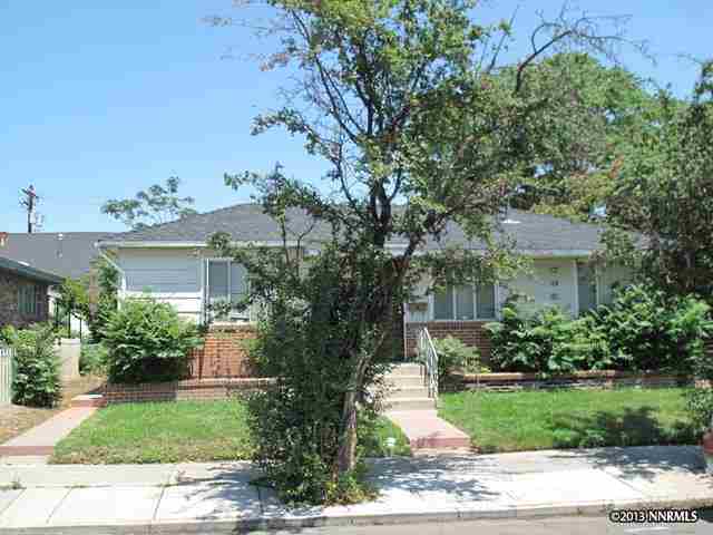 237 Stewart Street Reno, NV 89501 - Photo 1 of 1 front view of a house with a yard