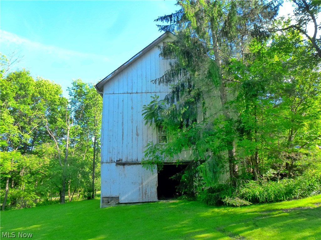 7984 Chagrin Road Chagrin Falls, OH 44023 - Photo 25 of 34 Side view of 40' x 30' barn from accessory building.