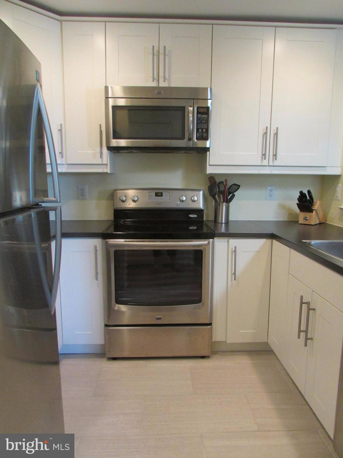 7703 Lexton Place, Unit 34 Springfield, VA 22152 - Photo 4 of 28 Kitchen