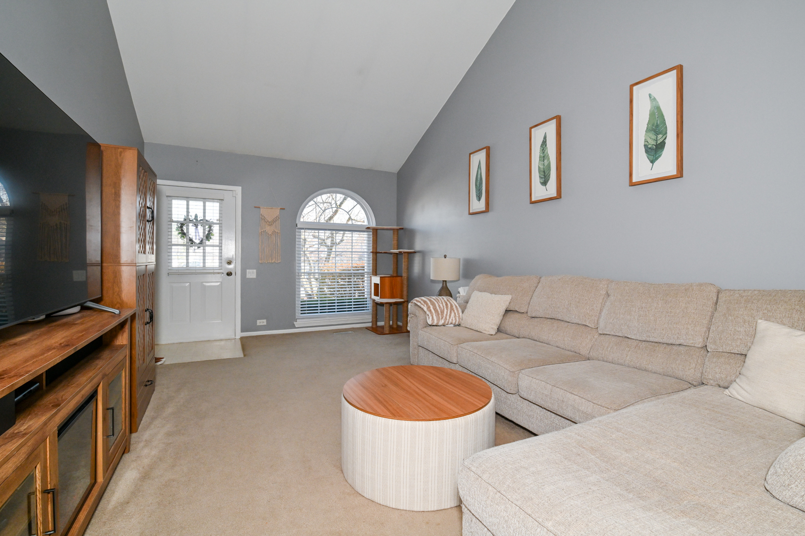 2092 Muirfield Circle Elgin, IL 60123 - Photo 3 of 14 a living room with furniture and a flat screen tv